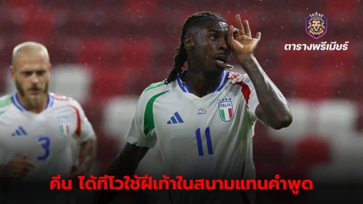 Moise Kean smiles widely after scoring for Italy in the UEFA Nations League.